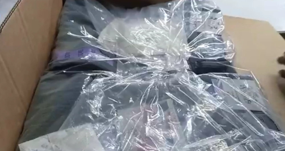 Secure Uniform Packaging and Delivery Custom uniforms securely packaged for nationwide delivery