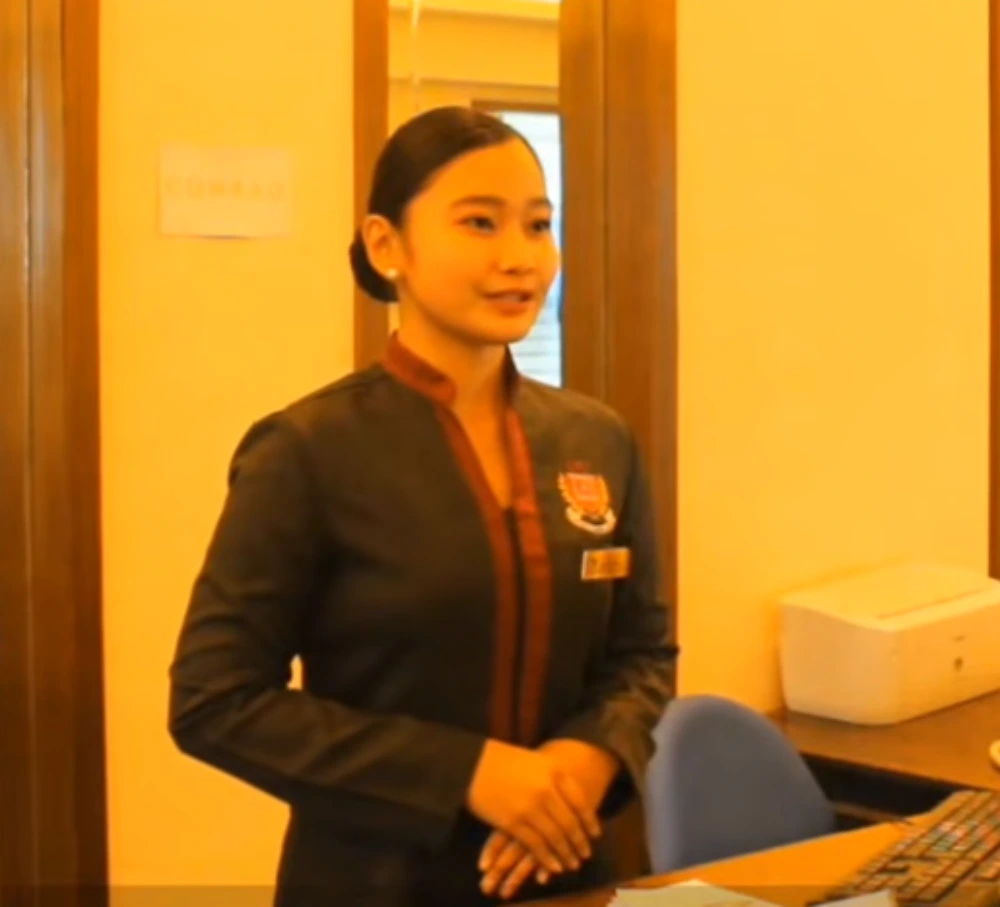Reception staff wearing professional uniforms